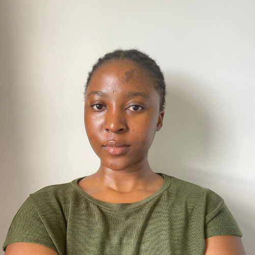 Tadiwa Tafa - HRUC International student studying at Uxbridge College. Wearing a green t-shirt.