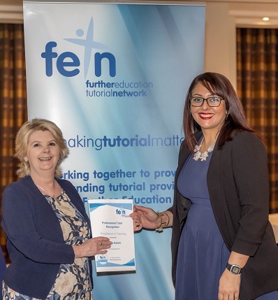 Tutor receiving certificate