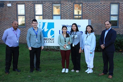 Tutors pictured with students from Nepal