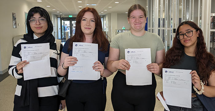 A group of Uxbridge College students showing their A Level results