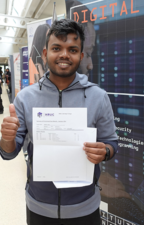 Jollan receiving his GCSE results
