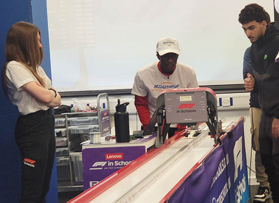 Our Uxbridge College Engineering students F1 in Schools Team racing their model cars at the competition.