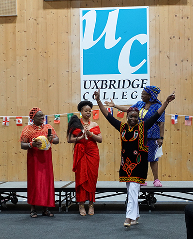 Uxbridge students wearing and showing their traditional cultural dress.